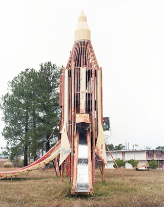 Illustration for article titled The haunting beauty of abandoned playground rockets